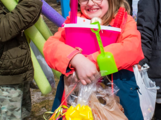 girl with Easter prizes
