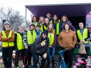 Set Free volunteers in front of the Stitches trailer
